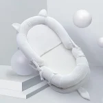 Bassinet bébé portable oreilles nouveauné confortable sécurisé design moderne usage quotidien et voyage