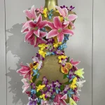 Mannequin décoratif fleuri pour exposition vêtements bébé mode artistique fête événement support créatif fleurs synthétiques style estival