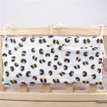 Organisateur mural bébé berceau motif léopard tissu coton rangement pratique chambre enfant style chic