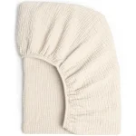 Housse de coussin bébé en coton respirant housse amovible beige texture plissée modernité et confort pour lit de bébé