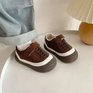 Chaussures en cuir bébé baskets semelle souple antiglissante premiers pas 46 ans design moderne collection 2025 brune Chaussures en cuir bébé baskets semelle souple antiglissante premiers pas 46 ans design moderne collection 2025 brune