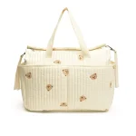 Sac à main bébé MUNIBag grande capacité ours brodé portable poussette sac à langer beige clair design ludique accessoires inclus usage quotidien nouvelle collection