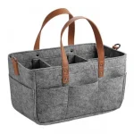 Panier de rangement en feutre pour bébé caddy à langer sac à couches portemouche compartiments internes design moderne style neutre couleur gris foncé