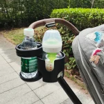 Portegobelet rotatif pour poussette double support bouteille et biberon plastique noir pratique et sécuritaire accessoire bébé