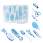 Kit soins bébé 9 pièces coupeongles brosse dentipeigne organisateur bleu motifs animaux