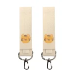 Accessoires bébé mignons en coton clips pour sacs à langer portage bébé design chat souriant 2 pièces facile à utiliser sécurisant style enfantin idéal pour maman