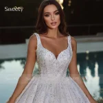 Robe de mariée à paillettes en organza perles col en V personnalisée robe princesse sans manches longueur plancher fermeture éclair style exquis mariage gala occasion spéciale