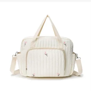 Sac à langer bébé coton floral brodé fermeture éclair poignées et bandoulière design moderne pour maman