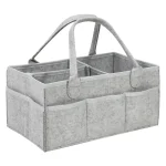Organisateur de poussette portable en feutre sac fourretout pliable avec compartiments et poches latérales idéal pour le rangement des couches et des affaires de bébé design moderne et minimaliste en gris clair