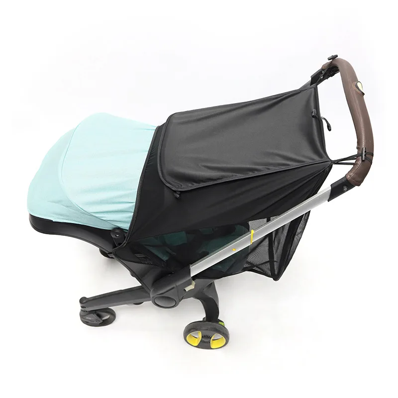 Poussette bébé compacte légère avec paresoleil filet ventilation design moderne matériaux durables antiUV couleur turquoise noir