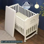 Lit bébé multifonctionnel en bois massif design européen blanc filet antimoustiques roulettes moderne sécurisé et pratique pour chambre bébé