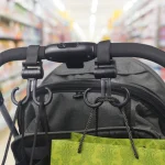 Support sac à main pour poussette accessoire poussette bébé double crochet fixation sécurisée tissu et plastique ABS style moderne noir et gris foncé