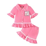 Ensemble pyjama Pâques bébé fille manches courtes short volants tissu doux rose motifs mignons idéal nuit maison