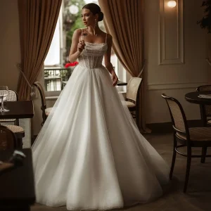 Robe de mariée à paillettes et perles bretelles spaghetti ligne A personnalisable 2025