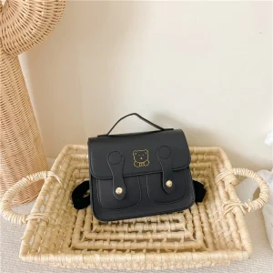 Sac à dos en cuir synthétique pour enfants sac écolier style moderne avec logo ours doré noir accessoires détachables portage facile