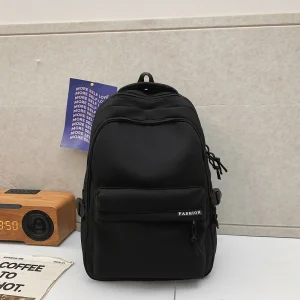 Sac à dos unisexe noir en nylon grande capacité style minimaliste idéal pour étudiants voyageurs ou portage bébé