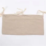 Sac de rangement multifonctionnel pour nouveauné 组织ateur de couches sac de rangement portable pour jouets boissons berceau lit sac à langer design minimaliste en tissu coton beige