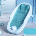 Baignoire bébé ergonomique inclinée antiglisse drainage intégré tapis de bain coussin tête filet de douche universel bleu