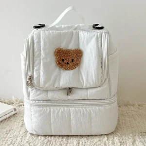 Sac à dos bébé portable MUNIBackpack sac à couches ALTERFormes design moderne avec ourson matière canvas fermeture éclair blanc idéal pour sorties et quotidien