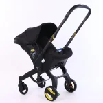 Siègeauto multifonctionnel 4 en 1 pour bébé compatible voiture et poussette groupe 0 doux et sécuritaire design moderne en noir et jaune