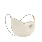 Sac fourretout en cuir souple pochette en forme de pois design minimaliste beige crème bandoulière ajustable sac à main et épaule nouvelle collection 2025