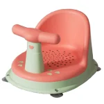 Chaise de jeu pour enfant avec volant design moderne couleur rose corail et vert pastel idéale pour jouer et développer la motricité
