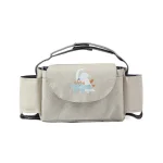 Sac de poussette multifonctionnel avec poches intégrées design ludique pour bébé facile à transporter