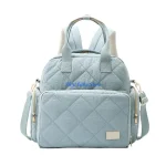 Sac à langer maternité bleu pastel Heyl baby Store sac de change portage bébé accessoires poussette épuré moderne fonctionnel