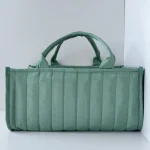 Organisateur de caddie à couches bébé panier rangement essentiels nouveauné station couches cadeau réception bébé incontournable élégant