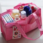 Organisateur portable à 7 compartiments pour maman sac à dos non tissé écofriendly poignées robustes grande capacité couleurs unies rose
