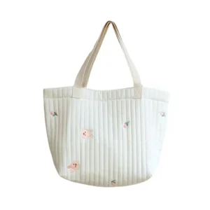 Sac à couches en coton brodé fourretout bébé grande capacité sac à dos maman poignées épaules motifs lapins fleurs blanc pastel style doux organisation quotidienne
