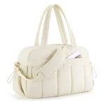 Sac à langer imperméable pour bébé sac de voyage sac à main bagage à main poussette beige style minimaliste portefeuille intégré poignées renforcées sangle ajustable nylon tissu matelassé usage polyvalent