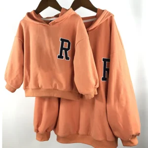 Sweat cropped MILANCEL logo R enfants vêtements décontractés coton doux couleur pêche style moderne manches bouffantes ajustement confortable