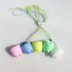 Collier à dents de bébé en plastique souvenir de dentition accessoire bébé cadeau naissance style coloré design ludique qualité premium 5 dents 1 pièce