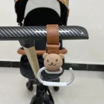 Crochet poussette en forme d&rsquo;ours accessoire de rangement pour sacs et objets légers design mignon et pratique