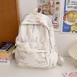 Sac à dos école design moderne style jeune tissu polyester nylon résistant compartiment zip bretelles ajustables blanc pastel motif lignes colorées