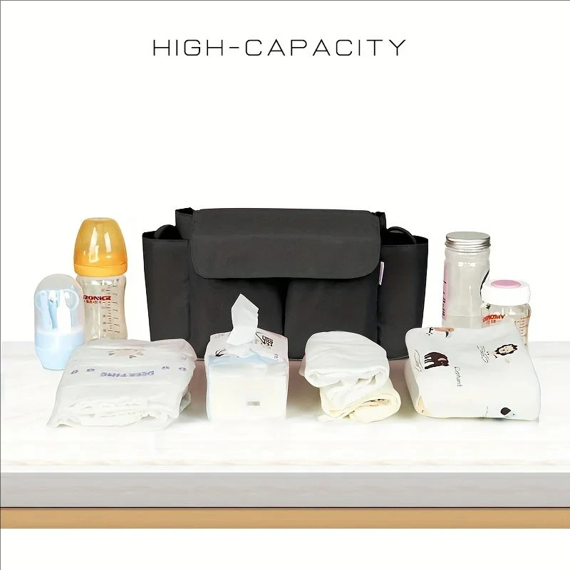 Sac de voyage pour poussette grand compartiment poches latérales attachement pratique design moderne usage quotidien rangement sécurisé accessoires bébé