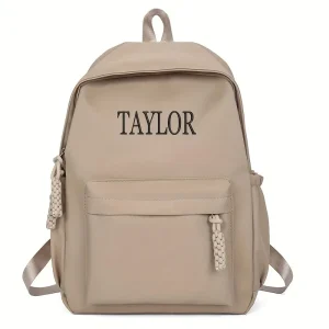 Sac à dos personnalisé pour enfants avec nom brodé conception moderne style minimaliste matériau durable usage quotidien cadeau éducatif