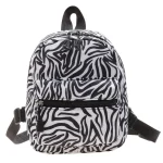 Sac à dos zèbre style moderne pour enfant école voyage portage quotidien design fun compact ajustable matériaux résistants idéal pour les jeunes
