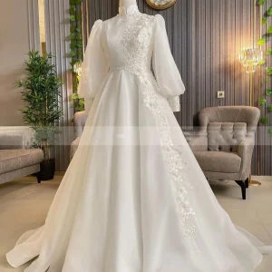 Robe de mariée musulmane longueur au sol manches longues dentelle élégante moderne collection 2023