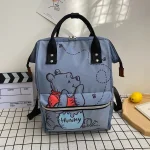 Disney Winnie l&rsquo;Ourson sac à dos à couches mignon pour bébé et maman grande capacité sac de voyage léger en tissu durable style cartoon