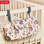 Organisateur de lit bébé Insular accessoires de berceau stockage bébé rangement biberons couches jouets design floral lapins mignons tissu doux sécurisé maman pratique