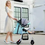 Poussette bébé pliable 4 roues design moderne couleur aqua capote rabattable rangement intégré Urban style portable