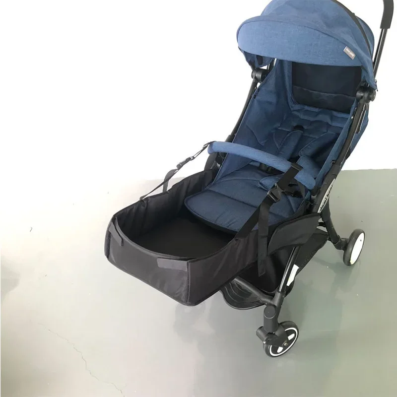 Reposepieds universel pour poussette plateau de rangement en tissu noir fixation facile avec sangles ajustables accessoire bébé pratique et sécuritaire