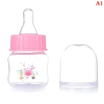 Biberon bébé sans BPA 50ml design crabe portable matériau PP tétine conique capuchon rose accessoire bébéปลอดภัย et pratique