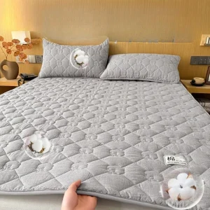 Surmatelas coton polyester matelassé gris pour lit bébé confortable hypoallergénique Surmatelas coton polyester matelassé gris pour lit bébé confortable hypoallergénique