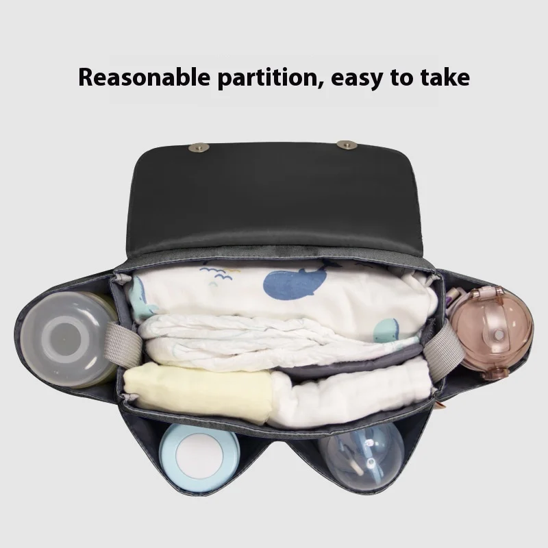 Sac de voyage pour poussette grand compartiment poches latérales attachement pratique design moderne usage quotidien rangement sécurisé accessoires bébé
