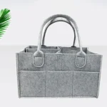 Panier organisation couches bébé feutre doux compartiments design moderne durable nursery caddie bébé