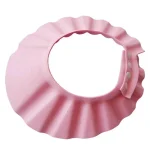 Bavette de bain pour bébé protègeyeux et oreilles silicone souple ajustable rose pastel hygiène et sécurité