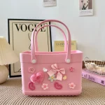 Sac fourretout de plage Eva en plastique souple design rose pastel avec coeurs et fleurs idéal pour les mamans